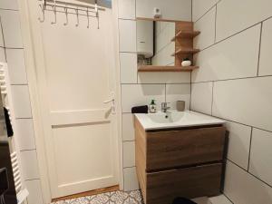 Kuchyňa alebo kuchynka v ubytovaní jolie cottage idéalement située
