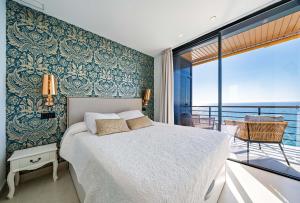 Postel nebo postele na pokoji v ubytování Varandas Do Mar