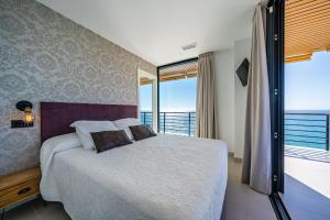 Postel nebo postele na pokoji v ubytování Varandas Do Mar