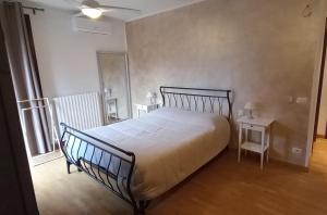 Postel nebo postele na pokoji v ubytování B&B GARDA IN