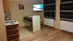 Kuchyňa alebo kuchynka v ubytovaní Gyulai Brill Apartman