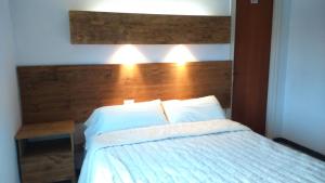 A bed or beds in a room at La Masia