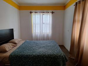 A bed or beds in a room at Hostel rivendell lima