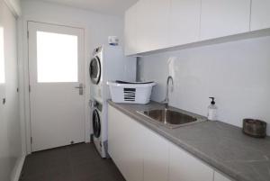 Kuchyň nebo kuchyňský kout v ubytování 43 Betka Road