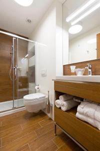 Phòng tắm tại Hotel Orasac Garni