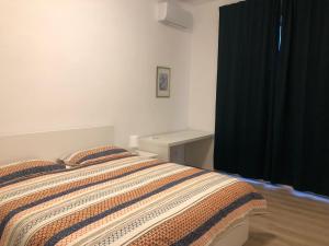 Postel nebo postele na pokoji v ubytování Solara Heaven, Mosta