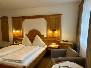 Postel nebo postele na pokoji v ubytování Seehotel Schäpfle
