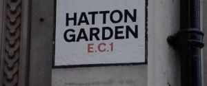 a sign on a door that reads attention garden exit at Stylish One Bedroom Flat Chancery Lane in London +2 photos