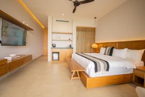 Postel nebo postele na pokoji v ubytování Amaranto Bacalar Hotel Boutique