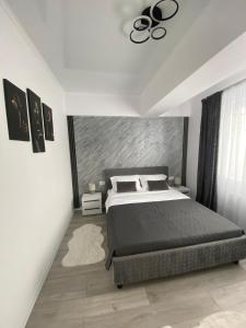 Postel nebo postele na pokoji v ubytování Apartament Modern Mamaia Nord