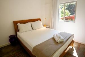 Ένα ή περισσότερα κρεβάτια σε δωμάτιο στο Refúgio no Jd. Botânico - Piscina, Sauna e Natureza +46 φωτογραφίες