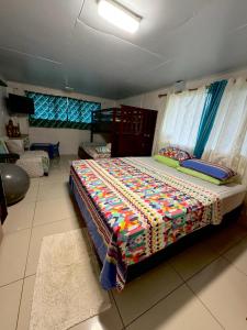 Postel nebo postele na pokoji v ubytování Mirimiri Spa Homestay + 9 fotografií