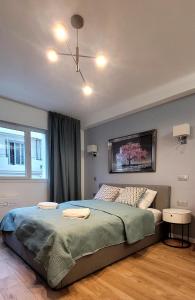 Ένα ή περισσότερα κρεβάτια σε δωμάτιο στο Cozy studio in the heart of Cannes