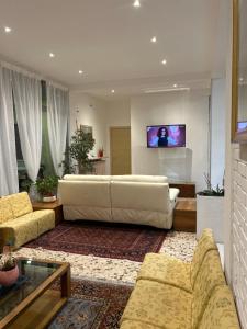 TV a/nebo společenská místnost v ubytování Hotel Marchina