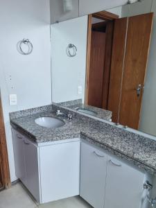 Kuchyň nebo kuchyňský kout v ubytování Apart Hotel Champagnat UN1206