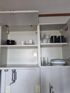 Kuchyň nebo kuchyňský kout v ubytování Apart Hotel Champagnat UN1206