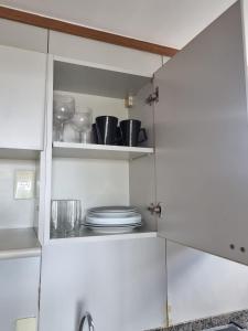 Kuchyň nebo kuchyňský kout v ubytování Apart Hotel Champagnat UN1206