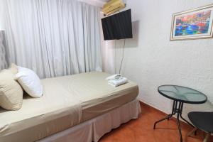 Rúm í herbergi á Casa Lomas