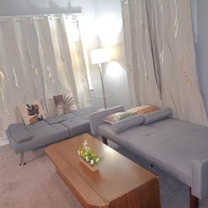 Χώρος καθιστικού στο Haven of Comfort