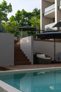 Bazén v ubytování Amaranto Bacalar Hotel Boutique nebo v jeho okolí