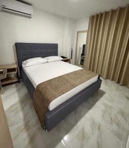 Katil atau katil-katil dalam bilik di Hotel Plaza Mayor Itagui