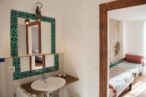 Boutique-Hotel Guesthouse Le Locle客房内的一张或多张床位