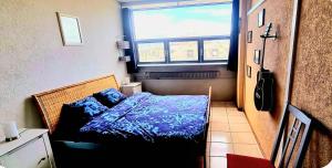 Postel nebo postele na pokoji v ubytování Appartement très lumineux au centre ville