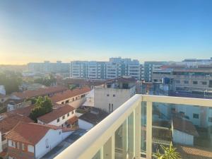 a view of a city from a balcony at Movida Cabo Frio in Cabo Frio