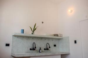 Una cocina o cocineta en Hostal 66