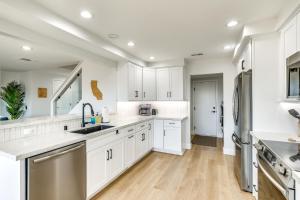 A kitchen or kitchenette at Balconies and Views Modern Abode in Poway!