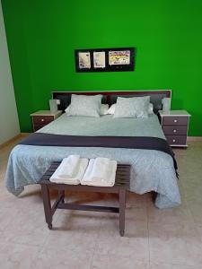 Postel nebo postele na pokoji v ubytování Villas Reina
