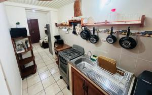 Køkken eller tekøkken på La casa del abuelo Tata