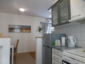 Kuchyň nebo kuchyňský kout v ubytování Apartment Emily
