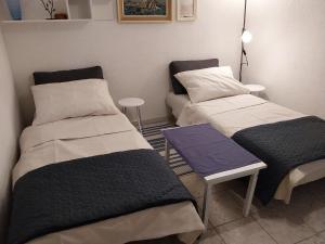 Postel nebo postele na pokoji v ubytování Family-friendly apartments with swimming pools Krasica, Rijeka - 18059