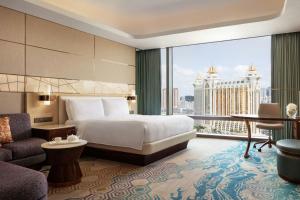 Voodi või voodid majutusasutuse JW Marriott Hotel Macau toas