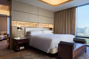 Voodi või voodid majutusasutuse JW Marriott Hotel Macau toas