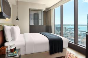 Postel nebo postele na pokoji v ubytování Hotel Indigo Auckland by IHG