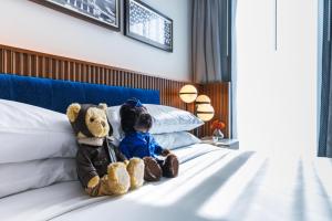 Postel nebo postele na pokoji v ubytování Hotel Polaris