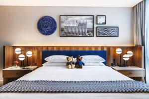 Postel nebo postele na pokoji v ubytování Hotel Polaris