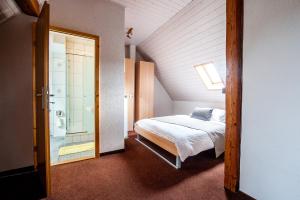 Postel nebo postele na pokoji v ubytování Hotel Acacia