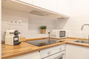 Una cocina o kitchenette en Centrally located apartment in Madrid