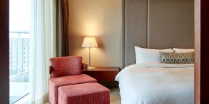 Voodi või voodid majutusasutuse Haevichi Hotel & Resort Jeju toas