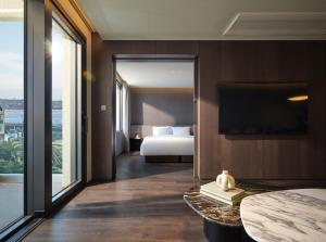 Voodi või voodid majutusasutuse Haevichi Hotel & Resort Jeju toas