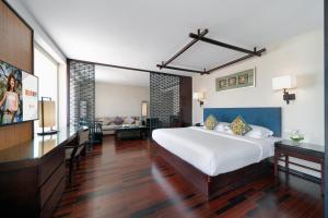 Postel nebo postele na pokoji v ubytování SSAW Boutique Hotel Hefei Intime Centre