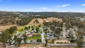 an aerial view of a parking lot in a town at Crows Nest Tourist Park in Crows Nest