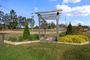 ailion in a park in a grass field at Crows Nest Tourist Park in Crows Nest