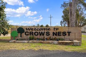 a sign that reads welcome to arrows nest at Crows Nest Tourist Park in Crows Nest