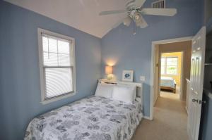 Ένα ή περισσότερα κρεβάτια σε δωμάτιο στο Joan's Caribbean Hideaway