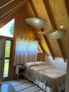 Postel nebo postele na pokoji v ubytování Cabaña Boutique Táva Home