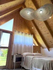 Postel nebo postele na pokoji v ubytování Cabaña Boutique Táva Home